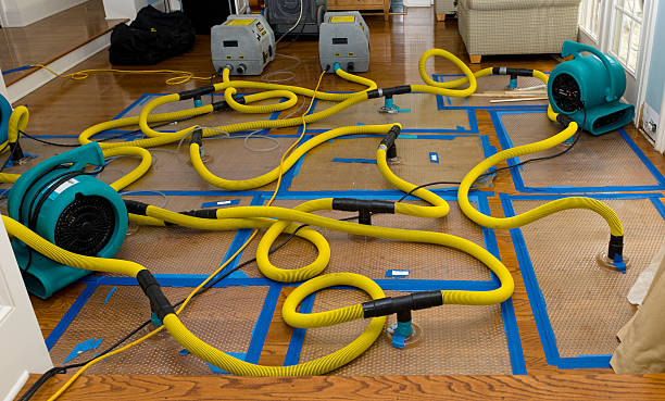 Professional Flood Damage Restoration technician working in Oak Grove, AL